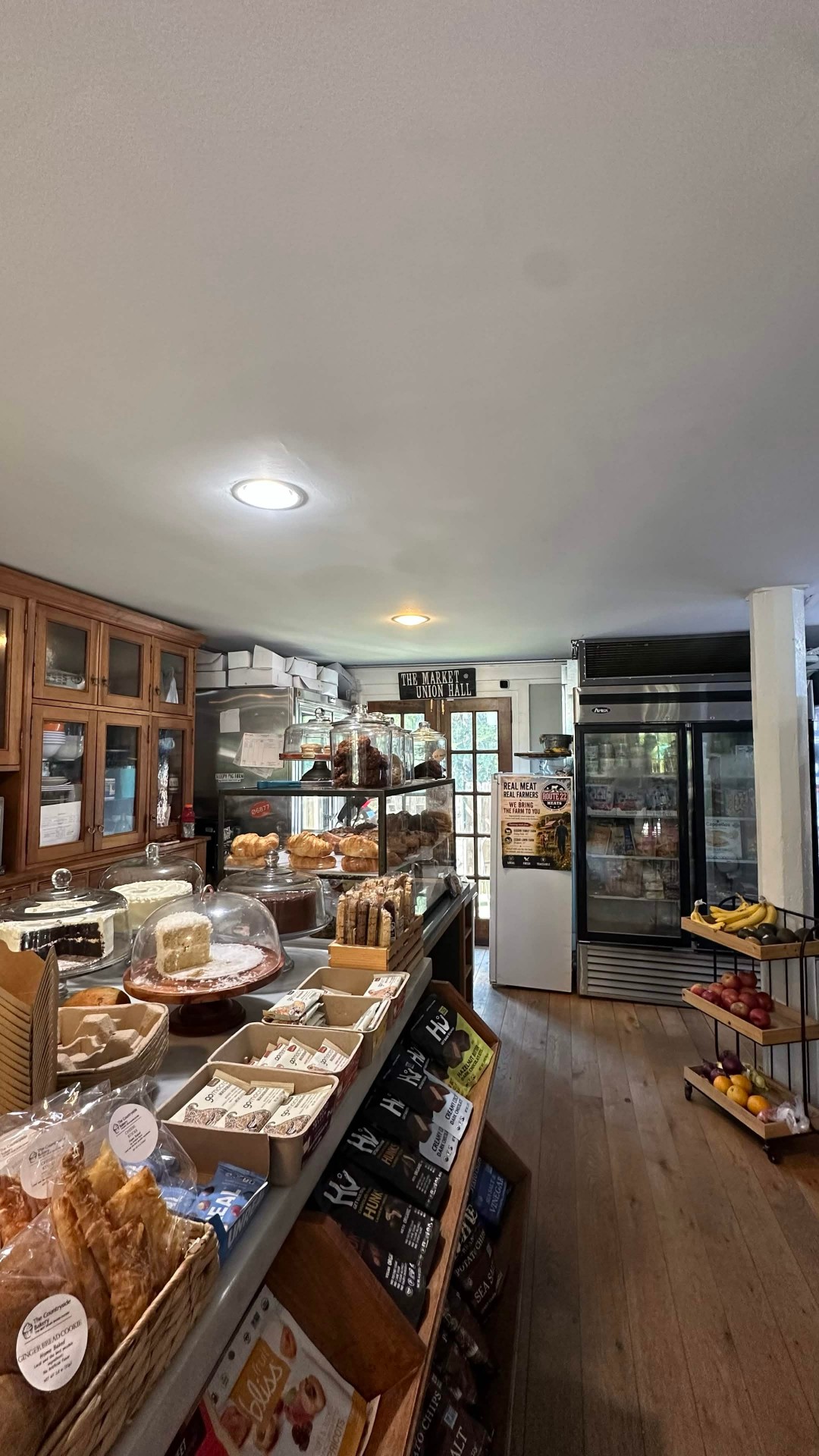 Fresh pastries and baked goods displayed at the market counter